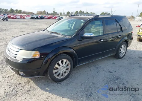 2008 Ford Taurus X Limited z USA, uszkodzony, nr VIN 1FMDK06W28GA06677